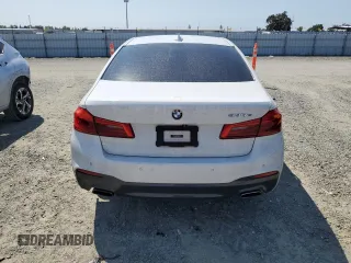 2020 BMW 5 Series 530e with VIN WBAJA9C03LCD28842, listed as a Copart auction lot 69901984 with 63,036 mi miles and Salvage Title. Bid and sale history available at DreamBid. Image 6.