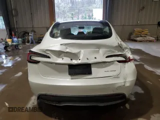 2025 Tesla Model 3 Long Range z VIN 5YJ3E1EBXSF942561, wystawiony jako Copart lot #52961935 z przebiegiem 5 911 mil mil oraz Szkoda całkowita • Salvage title. Historia ofert i sprzedaży dostępna na DreamBid. Obrazek 6.