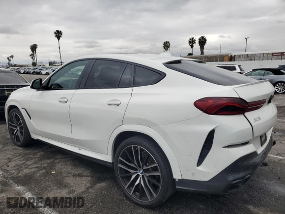 2022 BMW X6 xDrive40i z VIN 5UXCY6C08N9J21980, wystawiony jako Copart lot #48819745 z przebiegiem 24 431 mil mil oraz Szkoda całkowita • Salvage title. Historia ofert i sprzedaży dostępna na DreamBid. Obrazek 2.