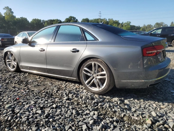 2015 Audi A8 with VIN WAUJGAFD3FN013026, listed as a Copart auction lot 67650374 with 88,064 mi miles and Salvage title. Bid and sale history available at DreamBid. Image 2.