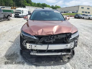 2024 Lexus RX 450h+ Luxury with VIN JTJCJMGA2R2012259, listed as a Copart auction lot 55716775 with 23,943 mi miles and Salvage title. Bid and sale history available at DreamBid. Image 5.