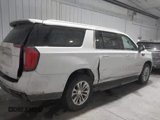 2021 GMC Yukon XL SLT with VIN 1GKS2GKD4MR414318, listed as a IAAI auction lot 41590618 with 49,913 mi miles. Bid and sale history available at carsss.com. Image 4.