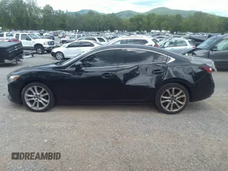 2015 Mazda 6 i Grand Touring with VIN JM1GJ1W68F1168078, listed as a IAAI auction lot 42149519 with 127,641 mi miles and . Bid and sale history available at DreamBid. Image 14.