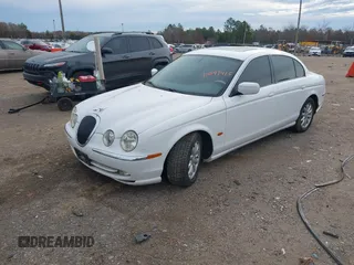 2002 Jaguar S-Type with VIN SAJDA01P12GM35163, listed as a IAAI auction lot 41097415 with 114,017 mi miles and . Bid and sale history available at DreamBid. Image 2.