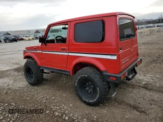 1986 Suzuki Samurai z VIN JS3JC51V4G4101985, wystawiony jako Copart lot #87197554 z przebiegiem Nie podano mil oraz Tytuł czysty. Historia ofert i sprzedaży dostępna na DreamBid. Obrazek 2.