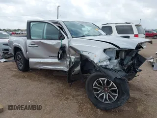 2022 Toyota Tacoma SR5 with VIN 3TMAZ5CN9NM175995, listed as a IAAI auction lot 42138786 with 34,870 mi miles and . Bid and sale history available at DreamBid. Image 1.
