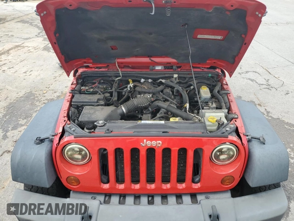 2008 Jeep Wrangler Rubicon with VIN 1J8GA641X8L586923, listed as a Copart auction lot 56243405 with 93,173 mi miles and Salvage title. Bid and sale history available at DreamBid. Image 12.