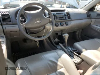 2004 Toyota Camry LE z VIN JTDBE32K640270298, wystawiony jako Copart lot #58800955 z przebiegiem 79 064 mil mil oraz Szkoda całkowita • Salvage title. Historia ofert i sprzedaży dostępna na DreamBid. Obrazek 8.