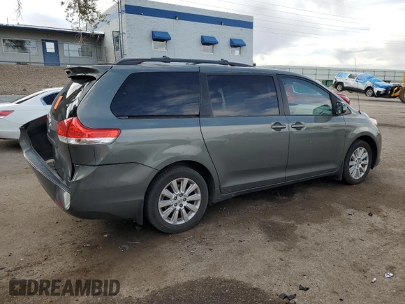 2014 Toyota Sienna LE with VIN 5TDJK3DC4ES085384, listed as a Copart auction lot 60375125 with 81,696 mi miles and Salvage title. Bid and sale history available at DreamBid. Image 3.