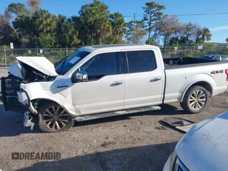 2016 Ford F-150 XLT with VIN 1FTFW1EF4GFA70555, listed as a IAAI auction lot 41733971 with 218,209 mi miles. Bid and sale history available at carsss.com. Image 14.
