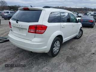 2016 Dodge Journey SE with VIN 3C4PDCAB1GT104630, listed as a IAAI auction lot 41731485 with 233,992 mi miles. Bid and sale history available at carsss.com. Image 4.
