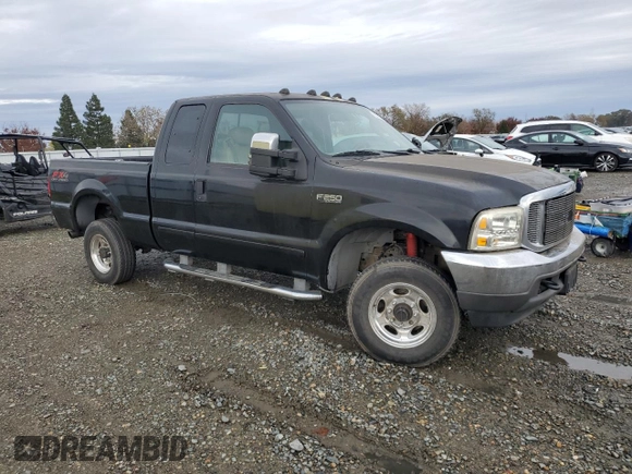 2003 Ford Super Duty F-250 XL with VIN 1FTNX21L13EB63351, listed as a Copart auction lot 85092674 with 265,515 mi miles and Salvage Title. Bid and sale history available at carsss.com. Image 4.