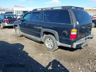 2004 Chevrolet Suburban Z71 with VIN 3GNFK16Z94G128052, listed as a IAAI auction lot 41616545 with 302,271 mi miles. Bid and sale history available at carsss.com. Image 3.