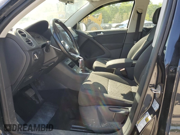 2017 Volkswagen Tiguan S with VIN WVGAV7AXXHK054783, listed as a Copart auction lot 52414725 with 156,671 mi miles and Salvage Title. Bid and sale history available at DreamBid. Image 7.