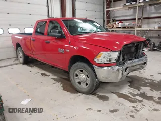 2015 Ram 2500 Tradesman z VIN 3C6UR4HJ8FG575972, wystawiony jako IAAI lot #41258474 z przebiegiem 337 730 mil mil oraz . Historia ofert i sprzedaży dostępna na DreamBid. Obrazek 1.