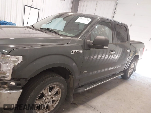 2015 Ford F-150 XLT with VIN 1FTEW1EP0FKE41589, listed as a IAAI auction lot 41345180 with 152,772 mi miles. Bid and sale history available at carsss.com. Image 14.