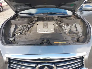 2015 Infiniti QX70 with VIN JN8CS1MWXFM480906, listed as a IAAI auction lot 41177811 with 176,527 mi miles and . Bid and sale history available at DreamBid. Image 10.