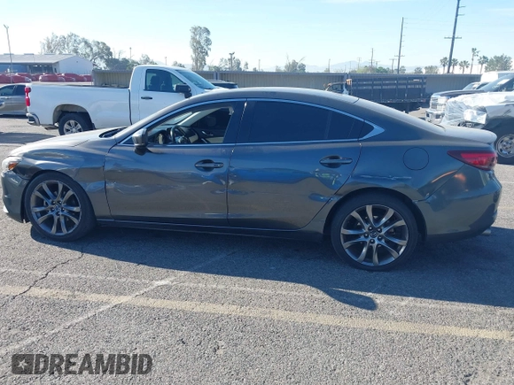 2017 Mazda 6 Grand Touring with VIN JM1GL1W51H1137470, listed as a IAAI auction lot 41872756 with 132,564 mi miles. Bid and sale history available at carsss.com. Image 14.