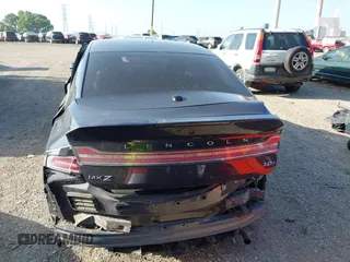 2014 Lincoln MKZ Hybrid z VIN 3LN6L2LU6ER803720, wystawiony jako IAAI lot #42560627 z przebiegiem 120 795 mil mil oraz . Historia ofert i sprzedaży dostępna na DreamBid. Obrazek 16.