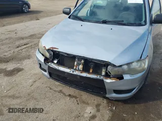 2009 Mitsubishi Lancer DE with VIN JA3AU16U79U007847, listed as a IAAI auction lot 41749150 with 155,795 mi miles. Bid and sale history available at carsss.com. Image 6.