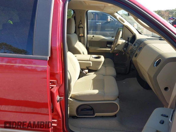 2007 Ford F-150 XLT with VIN 1FTRW12W57KD02864, listed as a IAAI auction lot 42771196 with 1,146,079 mi miles and . Bid and sale history available at DreamBid. Image 5.