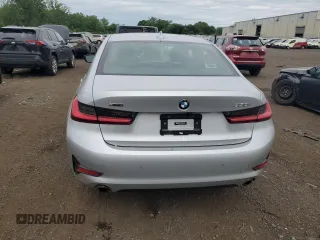 2021 BMW 3 Series 330i xDrive with VIN WBA5R7C0XMFK36218, listed as a Copart auction lot 62274005 with 47,467 mi miles and Salvage title. Bid and sale history available at DreamBid. Image 6.