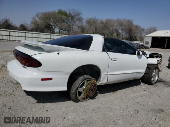 2002 Pontiac Firebird Formula z VIN 2G2FV22G222150957, wystawiony jako Copart lot #48037565 z przebiegiem 112 784 mil mil oraz Szkody całkowita. Historia ofert i sprzedaży dostępna na DreamBid. Obrazek 3.
