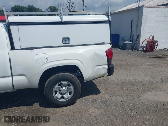 2020 Toyota Tacoma SR with VIN 5TFRX5GN9LX176803, listed as a IAAI auction lot 42646725 with 93,764 mi miles and . Bid and sale history available at DreamBid. Image 6.