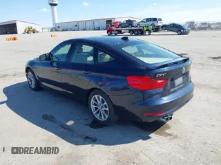 2014 BMW 3 Series 328i Gran Turismo xDrive with VIN WBA3X5C51ED557333, listed as a IAAI auction lot 41879900 with 101,737 mi miles and . Bid and sale history available at DreamBid. Image 3.
