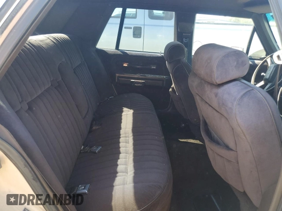 1987 Ford Crown Victoria z VIN 2FABP74F5HX169963, wystawiony jako Copart lot #75491944 z przebiegiem 89 729 mil mil oraz Szkody całkowita. Historia ofert i sprzedaży dostępna na DreamBid. Obrazek 10.