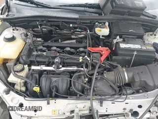 2007 Ford Focus S z VIN 1FAHP34N57W326220, wystawiony jako IAAI lot #42123072 z przebiegiem Nie podano mil oraz . Historia ofert i sprzedaży dostępna na DreamBid. Obrazek 10.
