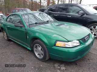 2001 Ford Mustang Standard with VIN 1FAFP40451F186932, listed as a IAAI auction lot 41519231 with 170,621 mi miles. Bid and sale history available at carsss.com. Image 1.