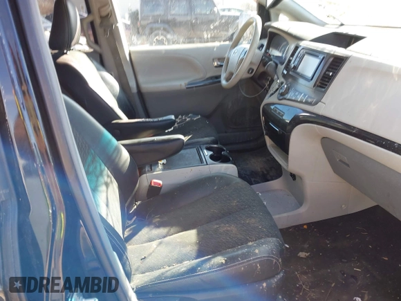 2014 Toyota Sienna SE with VIN 5TDXK3DC3ES521202, listed as a IAAI auction lot 41579320 with 182,982 mi miles and . Bid and sale history available at DreamBid. Image 5.
