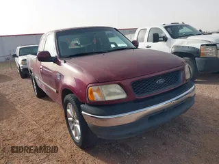 1998 Ford F-150 with VIN 1FTZX17WXWKB63416, listed as a IAAI auction lot 41604048 with 214,890 mi miles and . Bid and sale history available at DreamBid. Image 1.