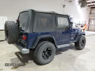 2002 Jeep Wrangler Sport with VIN 1J4FA49S82P703420, listed as a Copart auction lot 53322175 with 87,642 mi miles and Salvage Title. Bid and sale history available at carsss.com. Image 3.