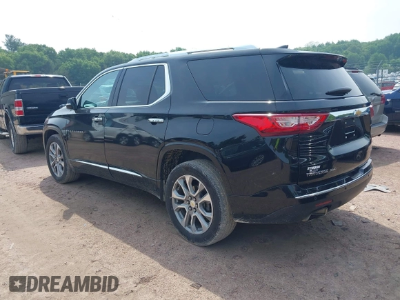 2019 Chevrolet Traverse Premier with VIN 1GNEVKKW1KJ282531, listed as a IAAI auction lot 42408361 with 95,464 mi miles and . Bid and sale history available at DreamBid. Image 3.