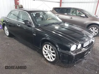 2009 Jaguar XJ 8 LWB with VIN SAJWA79B29SH31572, listed as a IAAI auction lot 42138154 with 147,500 mi miles and . Bid and sale history available at DreamBid. Image 1.