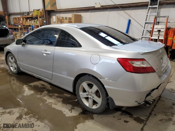 2009 Honda Civic Cpe LX with VIN 2HGFG11629H004799, listed as a Copart auction lot 85118994 with 199,993 mi miles and Salvage Title. Bid and sale history available at carsss.com. Image 2.