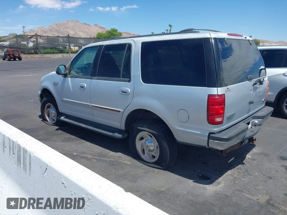 1999 Ford Expedition XLT z VIN 1FMPU18L8XLA69627, wystawiony jako IAAI lot #42847569 z przebiegiem Nie podano mil oraz . Historia ofert i sprzedaży dostępna na DreamBid. Obrazek 3.