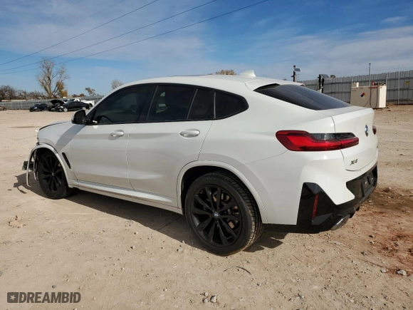 2023 BMW X4 xDrive30i with VIN 5UX33DT01P9P53029, listed as a Copart auction lot 84286824 with NaN miles and Salvage Title. Bid and sale history available at carsss.com. Image 2.
