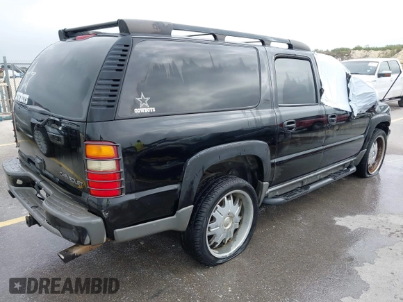 2002 Chevrolet Suburban LT with VIN 3GNFK16Z72G165792, listed as a IAAI auction lot 41921486 with 237,675 mi miles. Bid and sale history available at carsss.com. Image 4.