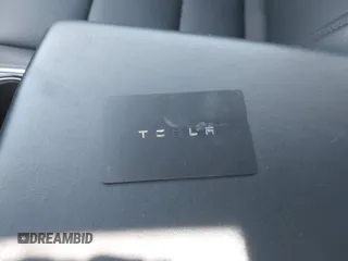 2018 Tesla Model 3 Long Range Battery z VIN 5YJ3E1EBXJF088444, wystawiony jako IAAI lot #42072860 z przebiegiem 46 063 mil mil oraz . Historia ofert i sprzedaży dostępna na DreamBid. Obrazek 11.