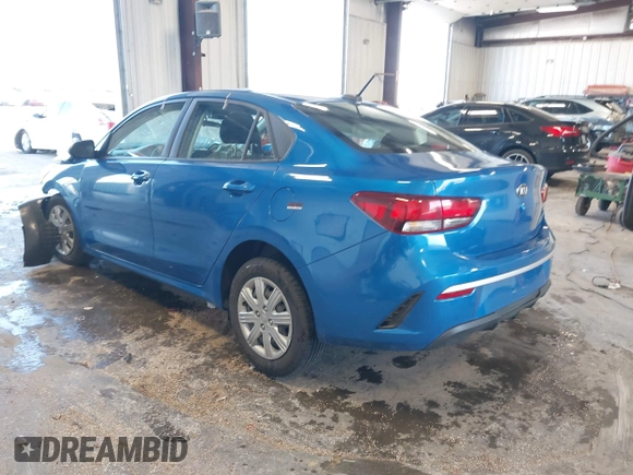 2021 Kia Rio S with VIN 3KPA24AD7ME364789, listed as a IAAI auction lot 42044676 with 54,072 mi miles and . Bid and sale history available at DreamBid. Image 3.