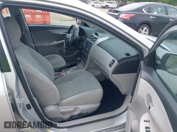 2013 Toyota Corolla L with VIN 5YFBU4EE0DP172081, listed as a IAAI auction lot 42115933 with 144,319 mi miles and . Bid and sale history available at DreamBid. Image 5.