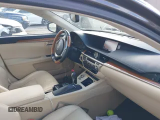 2014 Lexus ES 300h with VIN JTHBW1GG7E2040277, listed as a IAAI auction lot 41867667 with 104,623 mi miles and . Bid and sale history available at DreamBid. Image 5.