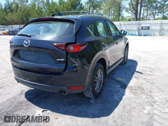 2018 Mazda CX-5 Sport with VIN JM3KFBBM4J0417018, listed as a IAAI auction lot 41984290 with 104,113 mi miles. Bid and sale history available at carsss.com. Image 4.