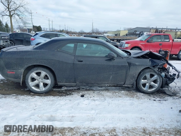 2012 Dodge Challenger SXT Plus z VIN 2C3CDYAG6CH106193, wystawiony jako IAAI lot #41641118 z przebiegiem 65 602 mil mil oraz . Historia ofert i sprzedaży dostępna na DreamBid. Obrazek 13.