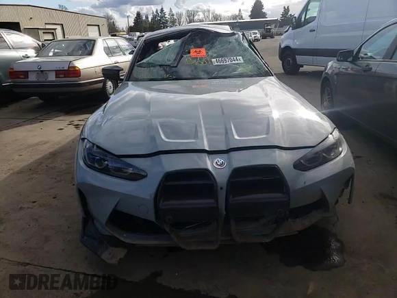 2022 BMW M3 Competition xDrive z VIN WBS43AY07NFM10293, wystawiony jako Copart lot #71593734 z przebiegiem Nie podano mil oraz Szkoda całkowita • Salvage title. Historia ofert i sprzedaży dostępna na DreamBid. Obrazek 11.