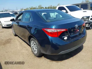 2019 Toyota Corolla L with VIN 2T1BURHE6KC185004, listed as a IAAI auction lot 42105629 with 111,907 mi miles. Bid and sale history available at carsss.com. Image 3.