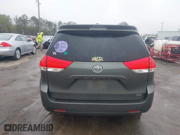 2013 Toyota Sienna XLE AAS with VIN 5TDYK3DC8DS401561, listed as a IAAI auction lot 41990044 with 214,111 mi miles and . Bid and sale history available at DreamBid. Image 16.